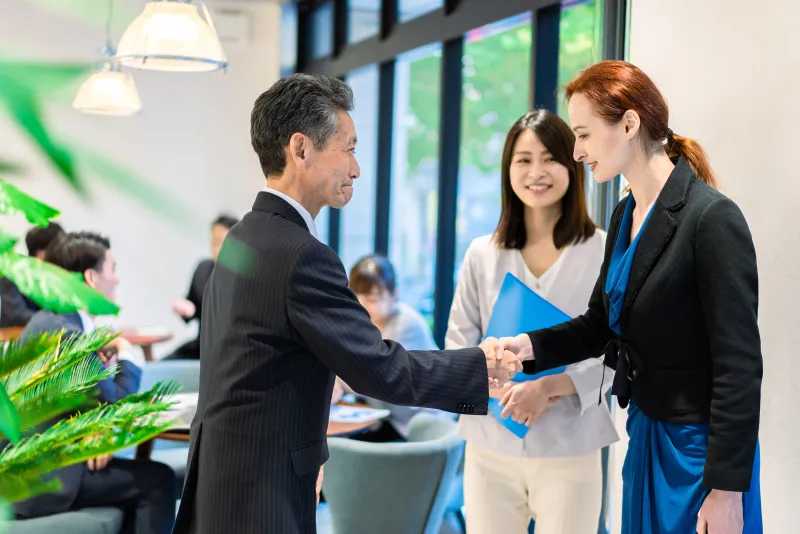 Business people in a meeting with an interpreter