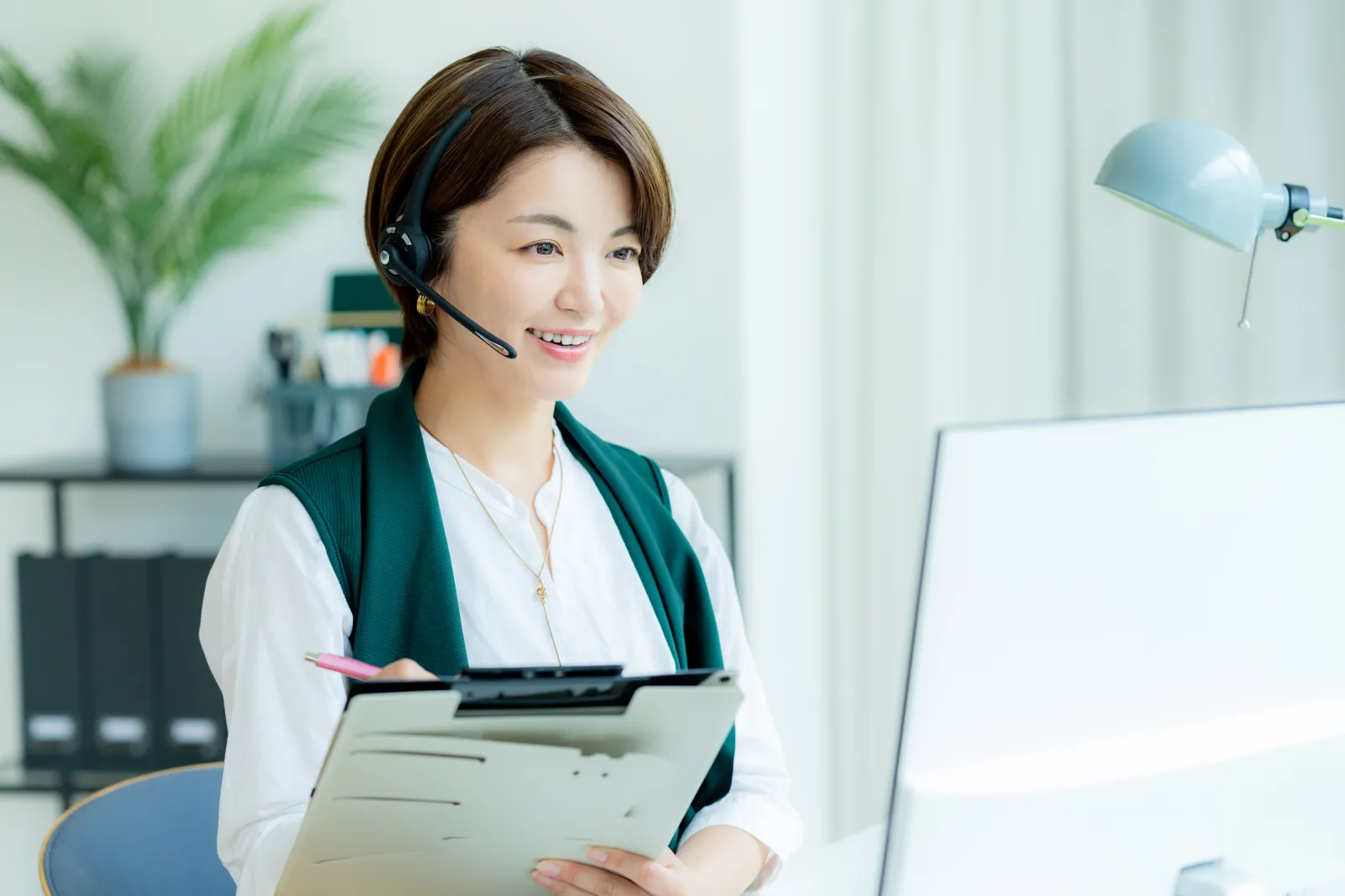 Staff member taking a call on a headset